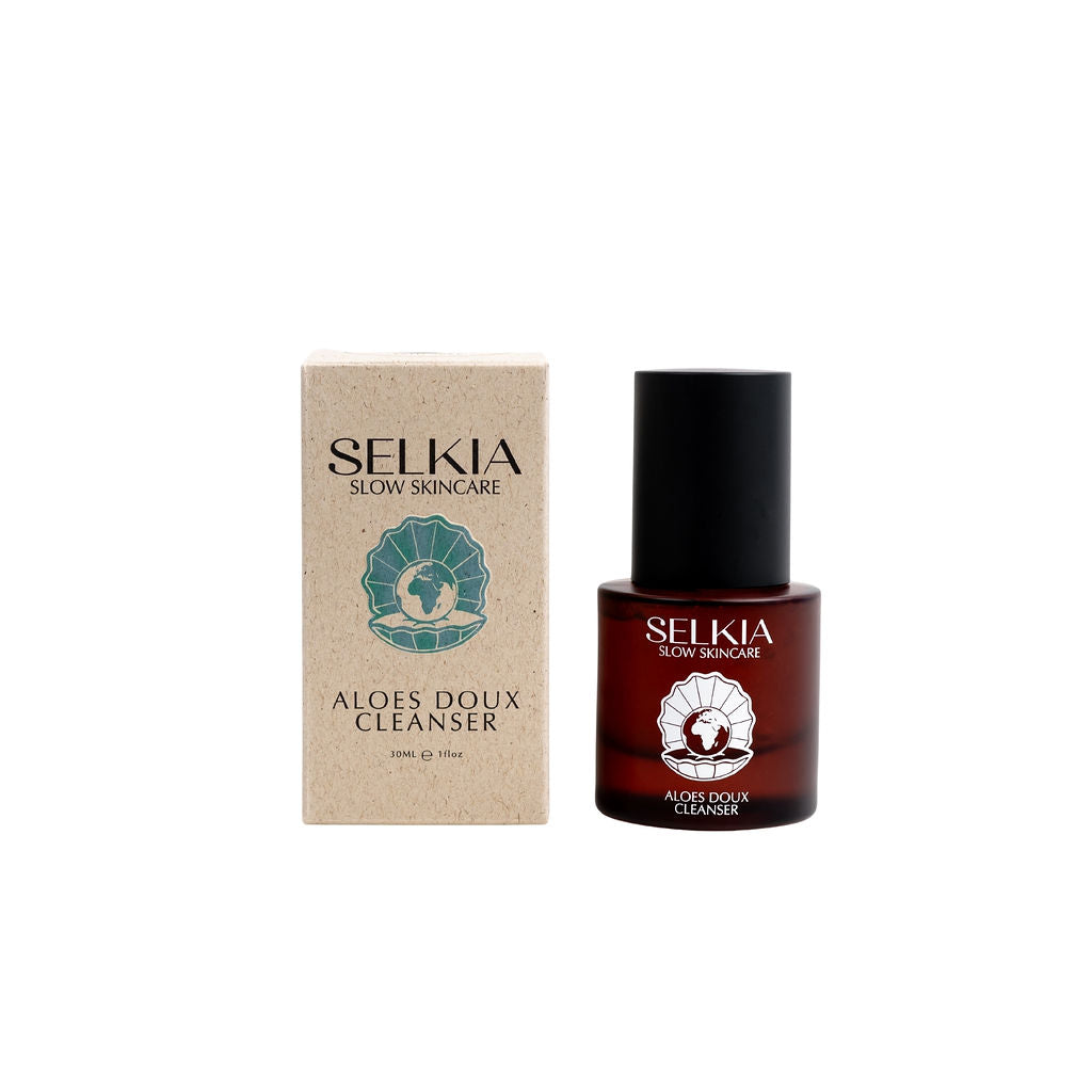 Australian made Selkia travel size natural aloe vera face wash cleanser displayed with sustainable box packaging and reuse-able glass jar product front view on white background