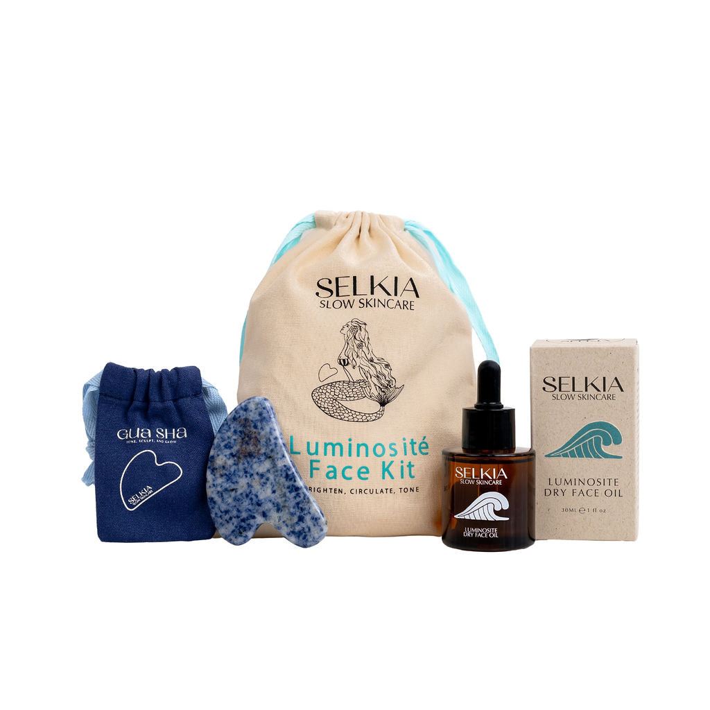 Australian made Selkia face kit product range contains reuse-able canvas bag, gua sha bag, stone massage tool, Selkia natural anti-aging dry face oil serum